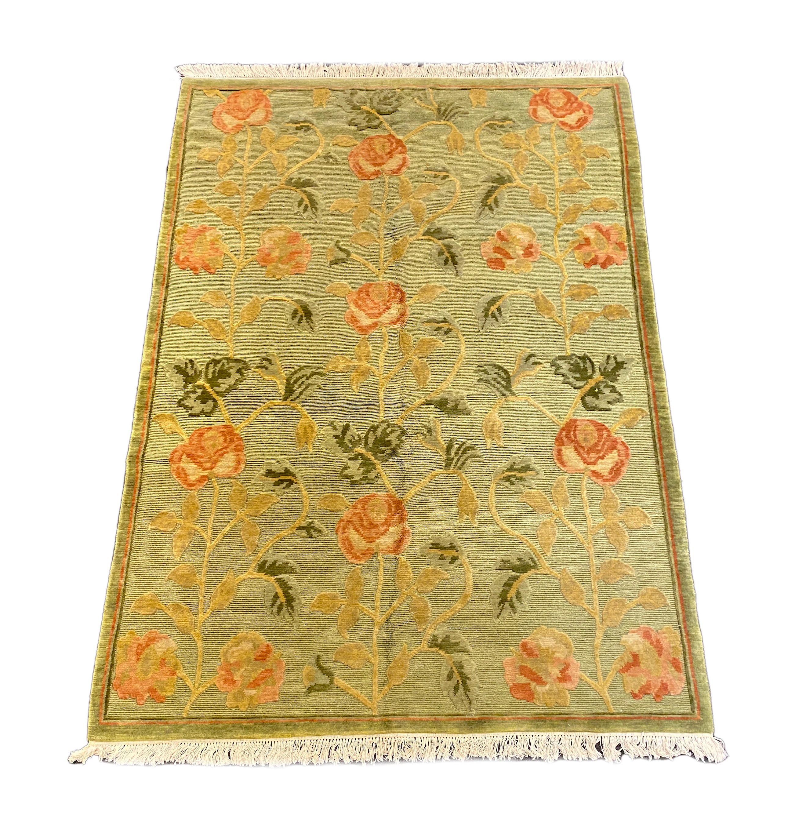 A Tibetan pale green ground carpet, 250cm x 176cm